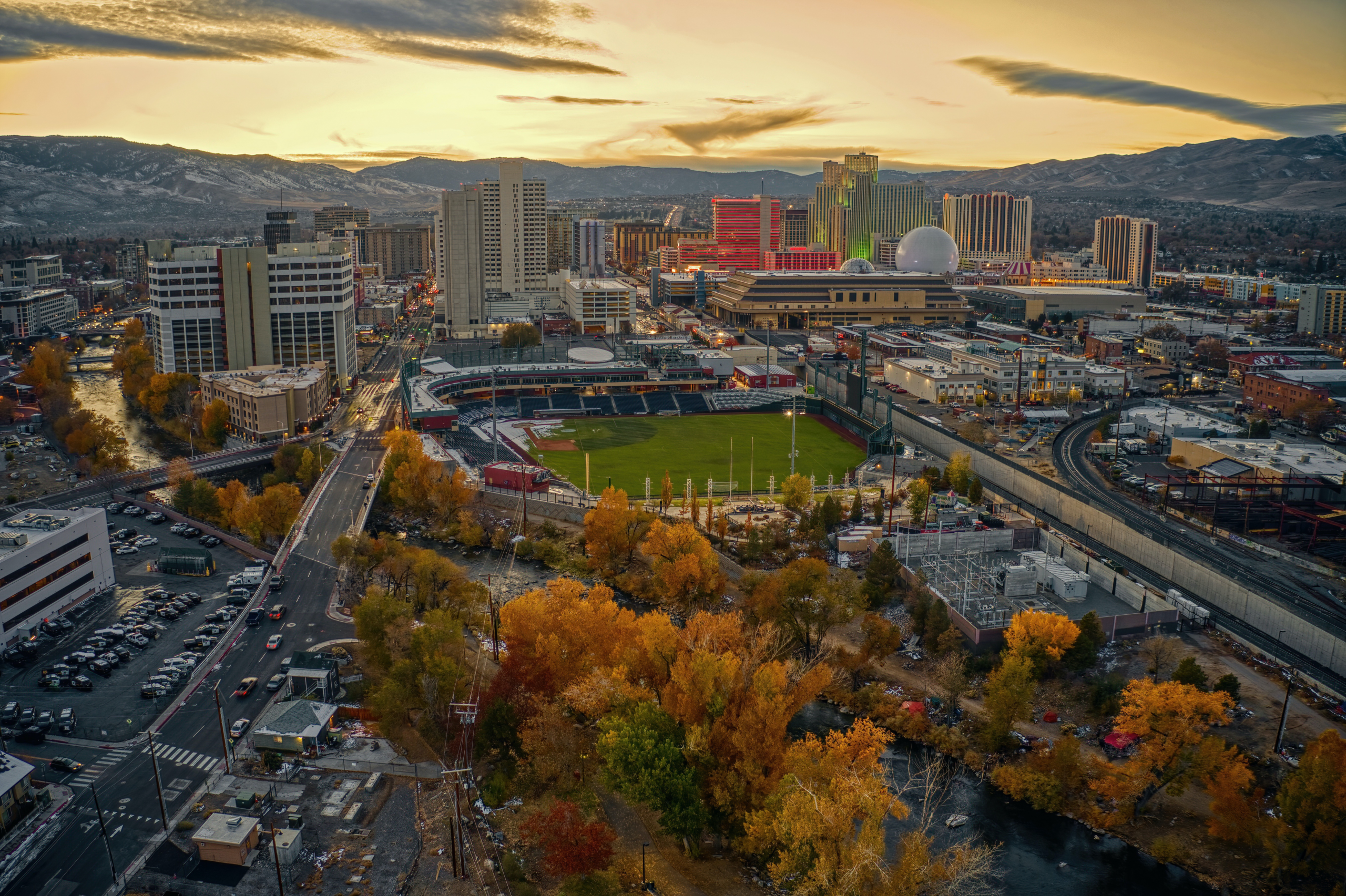 Reno Aces baseball game at Greater Nevada Field in downtown Reno Nevada with fans in the stands and mountain views