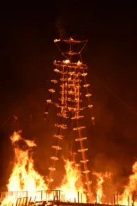 Art installations and participants at Burning Man in the Black Rock Desert of Nevada during the annual festival