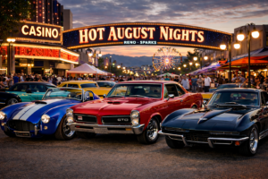 Classic cars at Hot August Nights in Reno Nevada featuring a blue Shelby, Pontiac GTO, and black 1960s Corvette with crowds and casino lights